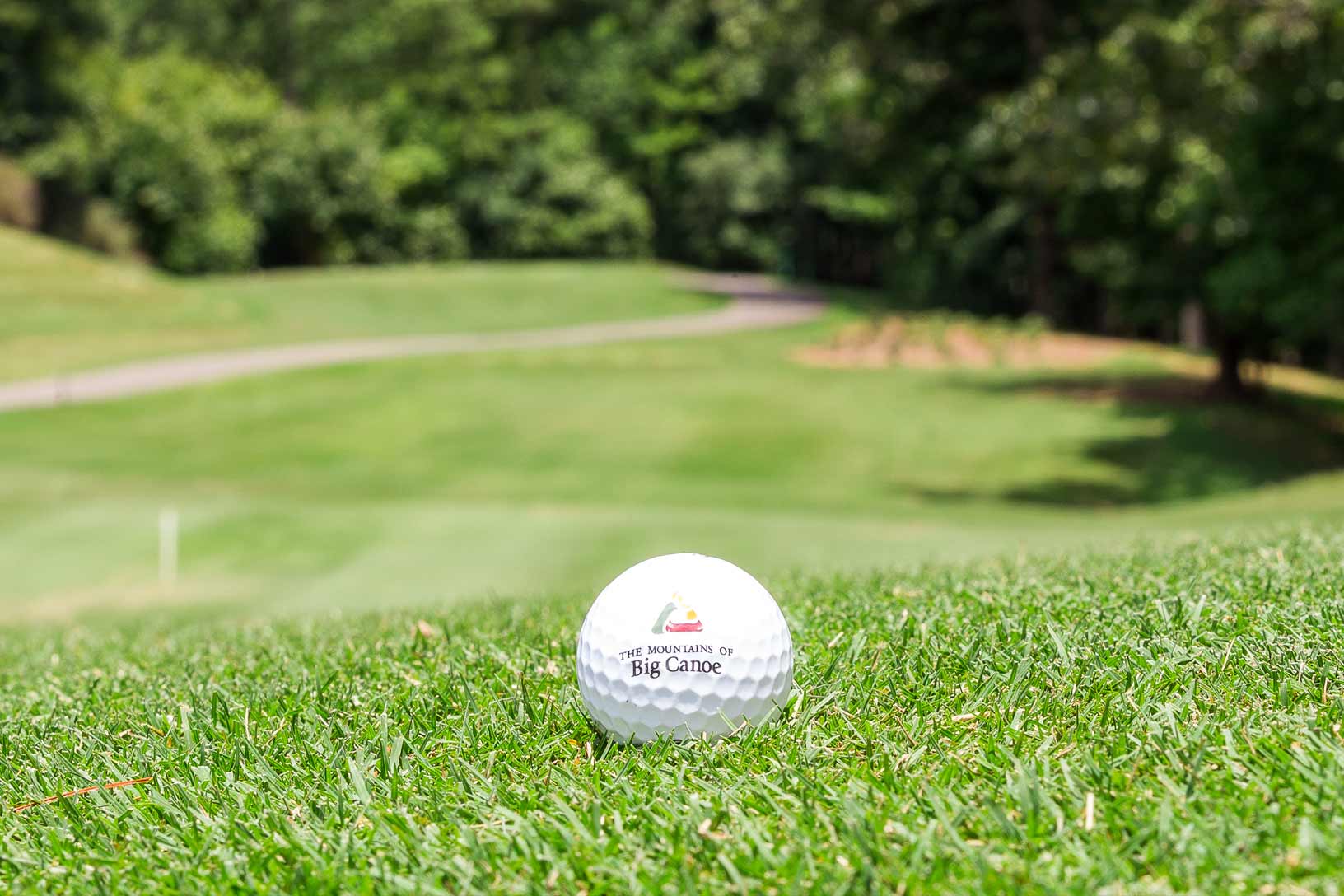 Big Canoe branded golf ball on the green